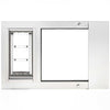 A white sliding glass door insert with a pet door._Color_White