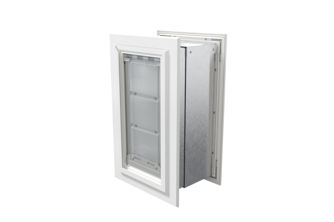 Angled view of a closed, white Endura Flap double flap wall mount pet door. This insulated dog door for wall helps maintain your home's temperature.