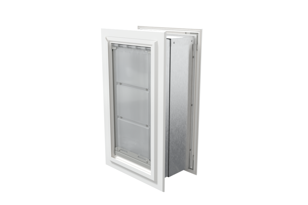 Angled view of a closed, white Endura Flap double flap wall mount pet door. This insulated dog door for wall helps maintain your home's temperature.