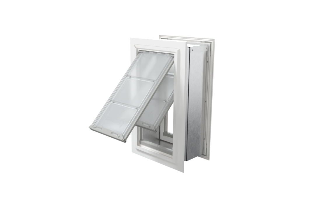 Angled view of an open, white Endura Flap double flap wall mount pet door. This extreme weather dog door for wall provides excellent insulation.